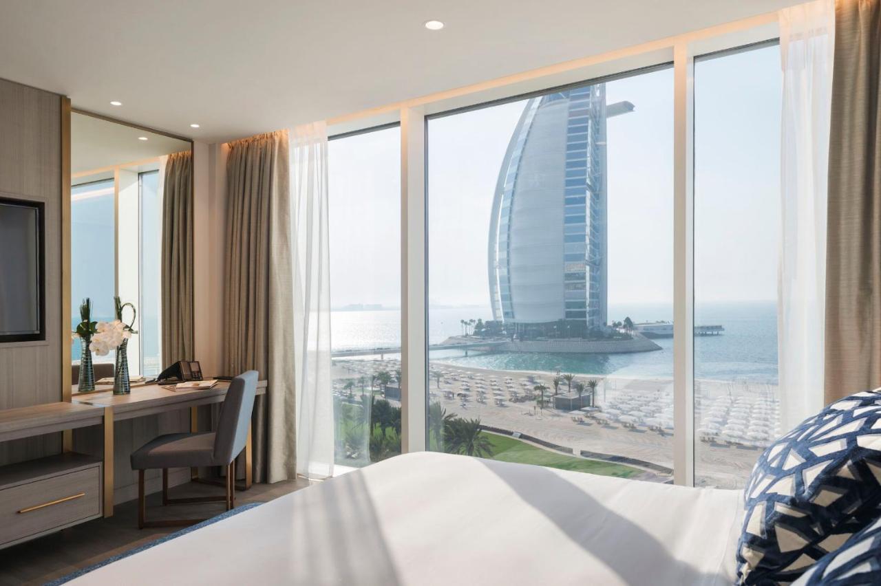 Jumeirah Beach Hotel Dubai Esterno foto A bedroom at Jumeirah Beach Hotel